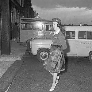 An Air Stewardess of Overseas Aviation walk towards the terminal at Gatwick Airport after An Air Stewardess of Overseas Aviation walk towards the terminal at Gatwick Airport after