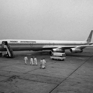 Aircraft Douglas DC8-61F of Trans International airways on the apron at Heathrow Airport Aircraft Douglas DC8-61F of Trans International airways on the apron at Heathrow Airport
