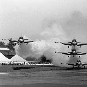 Aircraft Jet Provost trainers turn on the smoke Sept 1962 while landing in
