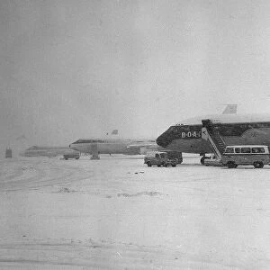 Aircraft parked at Heathrow Airport during a blizard in March 1965