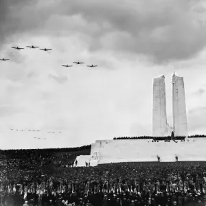 Aircraft of the Royal Air Force and French Air Force dip their wings in salute as they Aircraft of the Royal Air Force and French Air Force dip their wings in salute as they