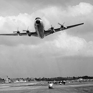 Aircraft Vickers Viscount turbo prop airliner flying at the SBAC Farnborough Air Show