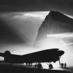 Print of a floodlit airfield at Gibraltar, circa October 1944