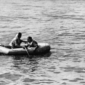 Two airmen adrift in their dinghy in the Indian Ocean. A Hurricane on patrol sighted Two airmen adrift in their dinghy in the Indian Ocean. A Hurricane on patrol sighted