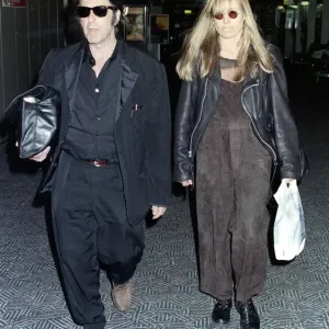 Al Pacino and Girlfriend at Heathrow Airport Print (1994) Al Pacino and Girlfriend at Heathrow Airport Print (1994)