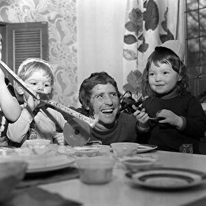 Alan Ball enjoys the third birthday party of his daughter Mandy (right