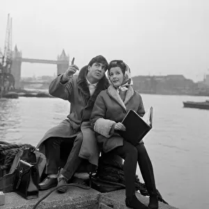 Alan Bates and Millicent Martin by the Thames during filming of