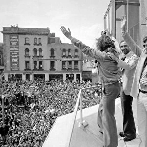 Alan Mullery Manager of Brighton FC - May1979 with players on a balcony