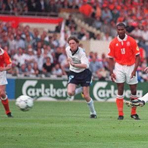 Alan Shearer scores Englands first goal during the England v Holland Euro 96 match