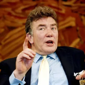 Albert Finney holding drink acting in play Reflected Glory