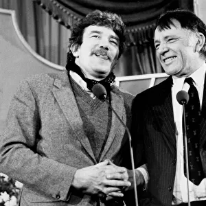 Albert Finney and Richard Burton at press conference laughing - February 1977
