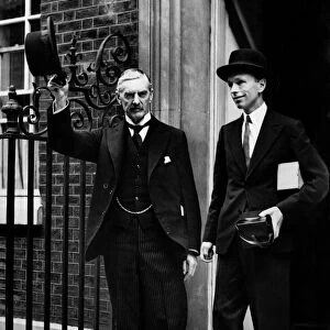 Alex Douglas Home at the age of 36, with Prime Minister Neville Chamberlain
