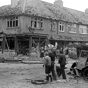 Alfieri. Air Raid damage, Malden. General scenes of ruined shops