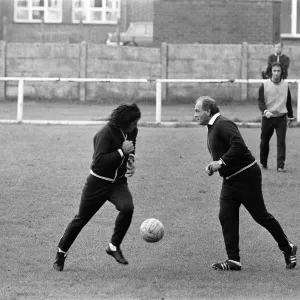 Alfredo Di Stefano shows his boys the Valencia FC how to do it as they train for their Alfredo Di Stefano shows his boys the Valencia FC how to do it as they train for their
