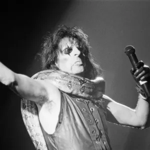 Alice Cooper (born Vincent Damon Furnier) performs at The Birmingham Odeon, Midlands Alice Cooper (born Vincent Damon Furnier) performs at The Birmingham Odeon, Midlands