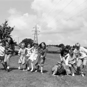 All fall down! Contestants in the three-legged race at Scissett C of E First School All fall down! Contestants in the three-legged race at Scissett C of E First School