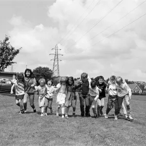 All fall down! Contestants in the three-legged race at Scissett C of E First School All fall down! Contestants in the three-legged race at Scissett C of E First School