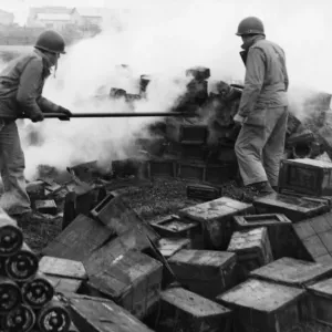 Allied soldiers of the Fifth Army fight to extinguish flames in an ammunition dump in Allied soldiers of the Fifth Army fight to extinguish flames in an ammunition dump in
