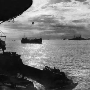 Print of Allied troops unloading supplies on Normandy beaches, July 1944