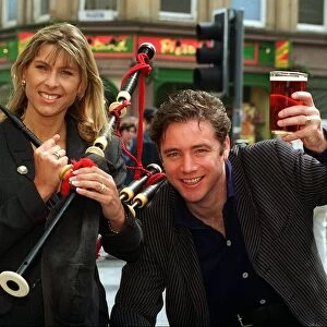 Ally McCoist Rangers football player holding up pint of beer