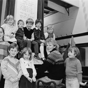 Almondbury Methodist Junior Church Christmas Party, singing carols round the piano Almondbury Methodist Junior Church Christmas Party, singing carols round the piano