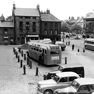 Alnwick Market Place, virtually traffic free 31 May 1954