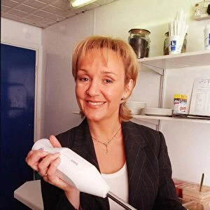 Amanda Reddington actress March 1998 is pictured holding a Bamix swiss made hand held