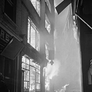 Amen Corner shops blaze furiously as nine thousand incendiary bombs fall on the city of