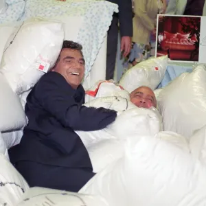 American actor Burt Reynolds opening the Harrods Sale. Pictured with Harrods owner