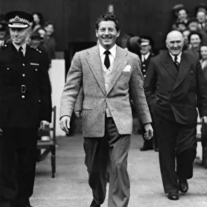American actor and comedian Danny Kaye walks out onto the pitch at Hampden Park prior to