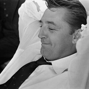 American actor Robert Mitchum during a press interview in London