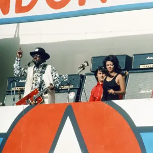 American blues musician Bo Diddley performing in concert during a Rock American blues musician Bo Diddley performing in concert during a Rock