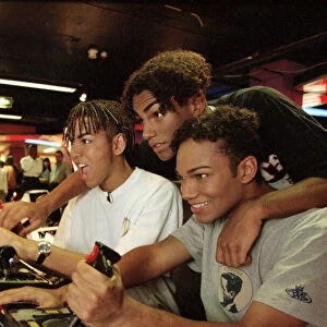 American boy band 3T playing video games at an Arcade 9th September 1996