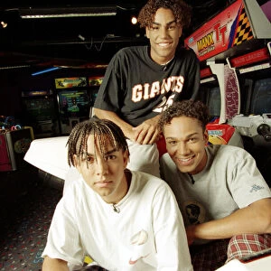 American boy band 3T playing video games at an Arcade 9th September 1996