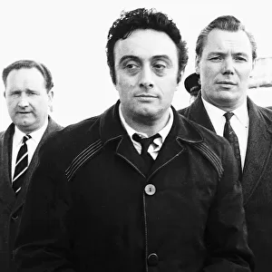 American comedian Lenny Bruce turned away from Heathrow Airport by policeman after
