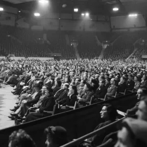 American evangelist Billy Graham speaks to the crowd at the Harringay Arena in North American evangelist Billy Graham speaks to the crowd at the Harringay Arena in North