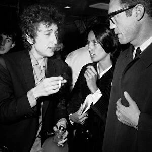 American folk legend Bob Dylan arriving at London airport with Joan Baez