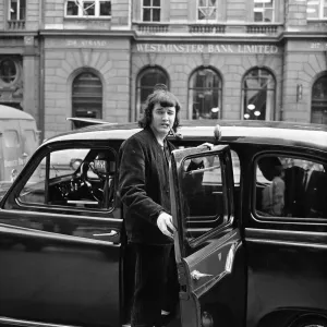 American singer P. J. Proby pictured outside the law courts after his visit to the high