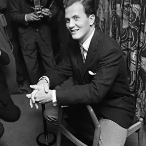 American singer, Pat Boone. He is in London for the "
