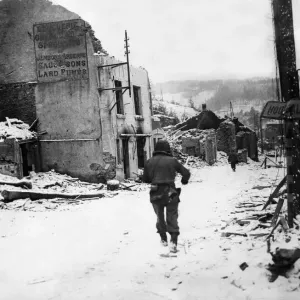 American soldiers of the US 2nd Armoured Division advance in the role of infantry