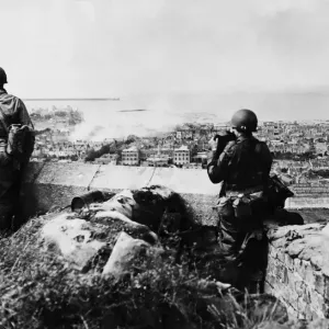 American troops on a hill overlooking the city and harbour in Cherbourg American troops on a hill overlooking the city and harbour in Cherbourg