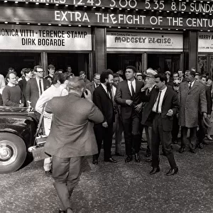 American world champion heavyweight boxer Muhammad Ali leaves the Odeon Cinema in