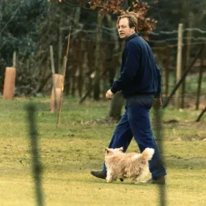 Andrew Parker Bowles husband of Camilla Parker Bowles is seen out walking their pet dog