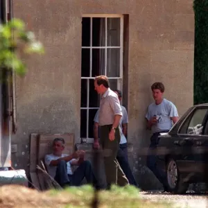 Andrew Parker Bowles supervises removal men as he moves his belongings from Middlewick