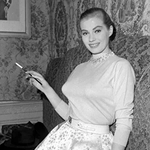 Anita Ekberg seen here attending a Press reception in London with actor Michael Wilding