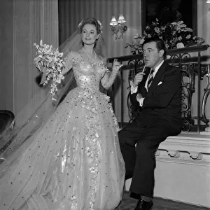 Anna Neagle and Michael Wilding as a bride and groom in "Maytime in Mayfair"