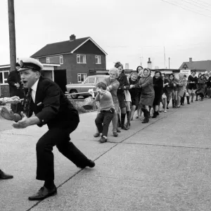 The annual Tug O war battle of the sexes took place yesterday outside the Pilot Pub The annual Tug O war battle of the sexes took place yesterday outside the Pilot Pub