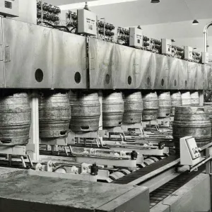 Ansells Brewery. Beer kegs being filled, and full ones discharged