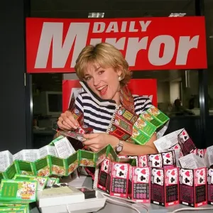 Anthea Turner TV Presenter mans the Daily Mirror National Lottery Scratchcards