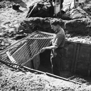 Because of anti-personnel bombs, everybody digs in. Pte. W Because of anti-personnel bombs, everybody digs in. Pte. W